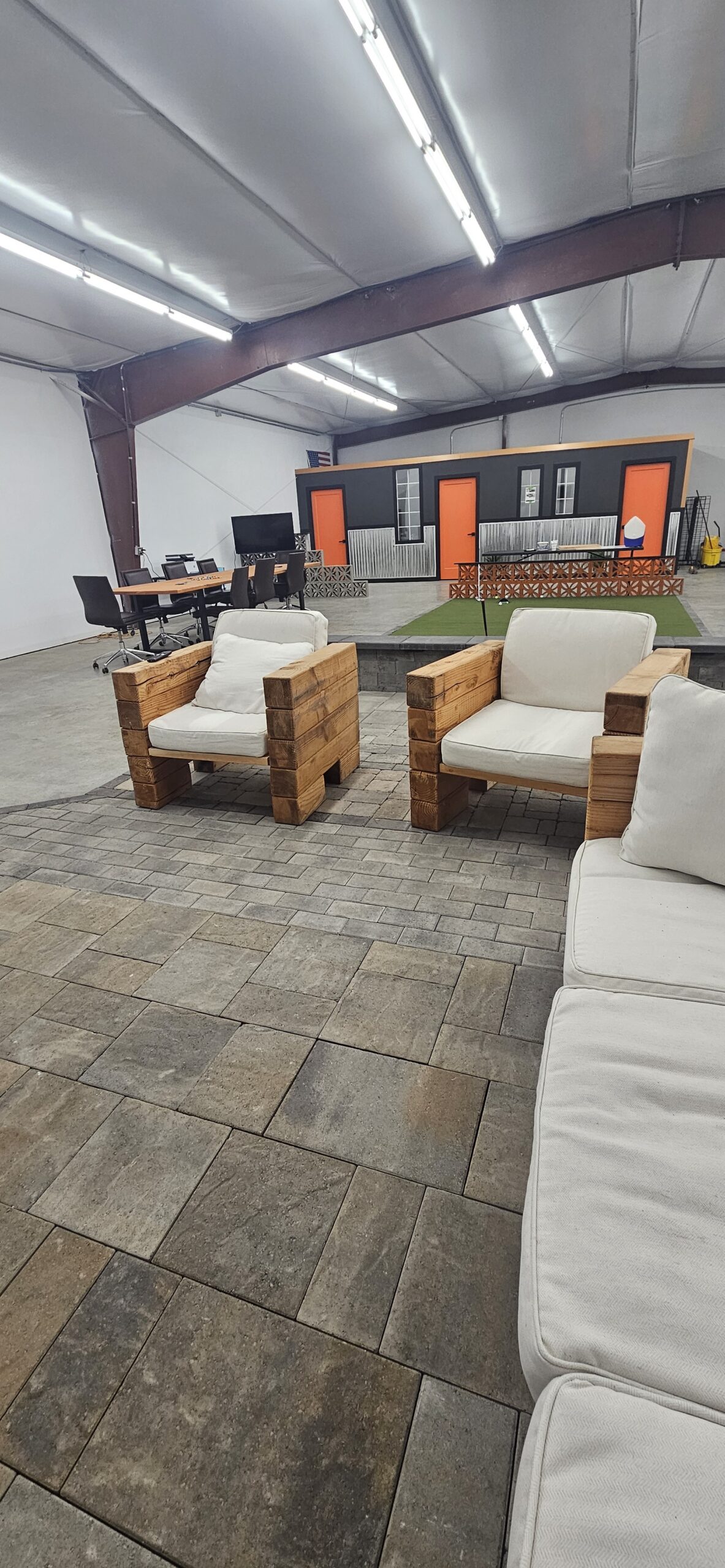 Base Yards lobby and lounge with putting green